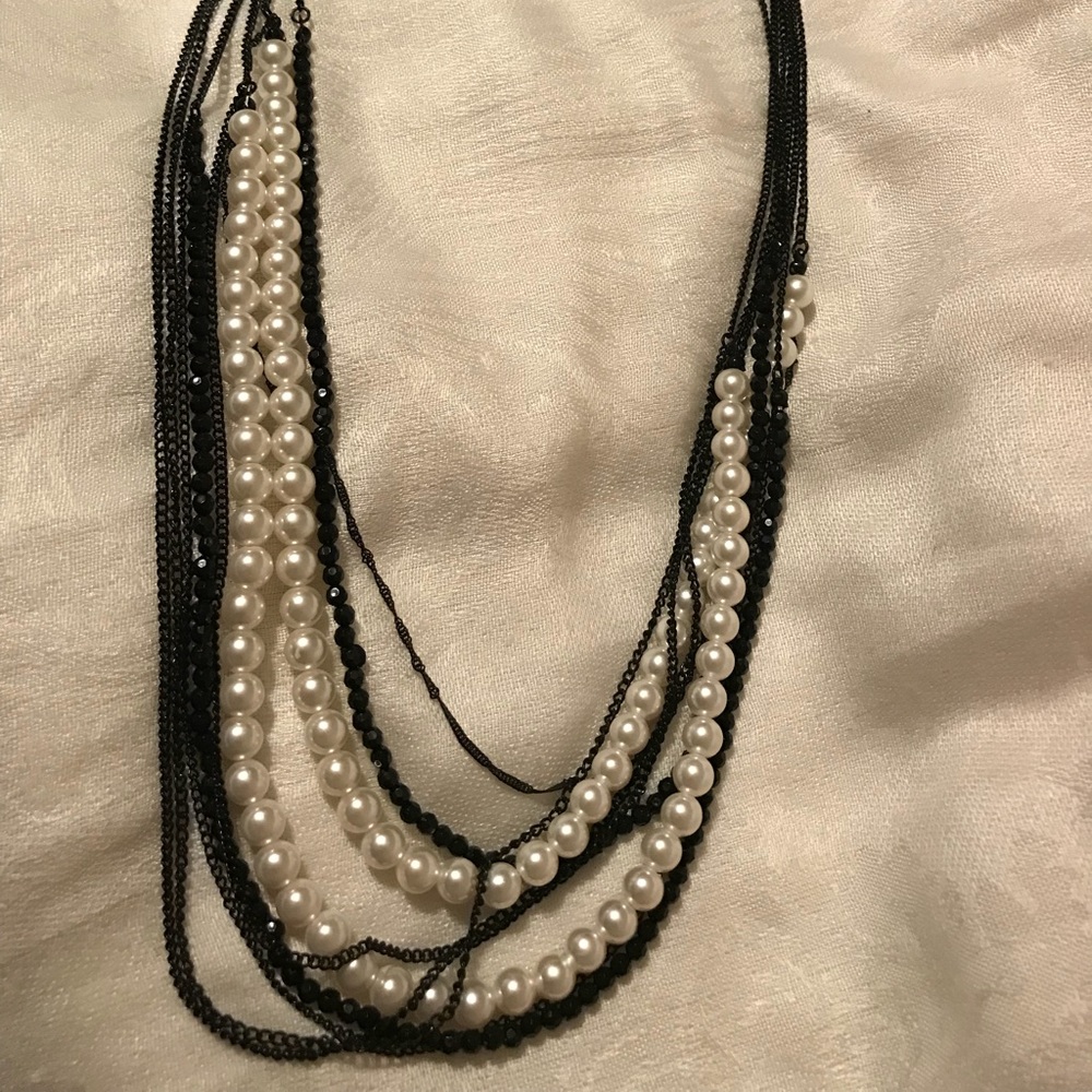 Long black and pearl necklace